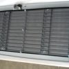 Freightliner FL 60 / 70 Grille: Plastic. Also fits FL112